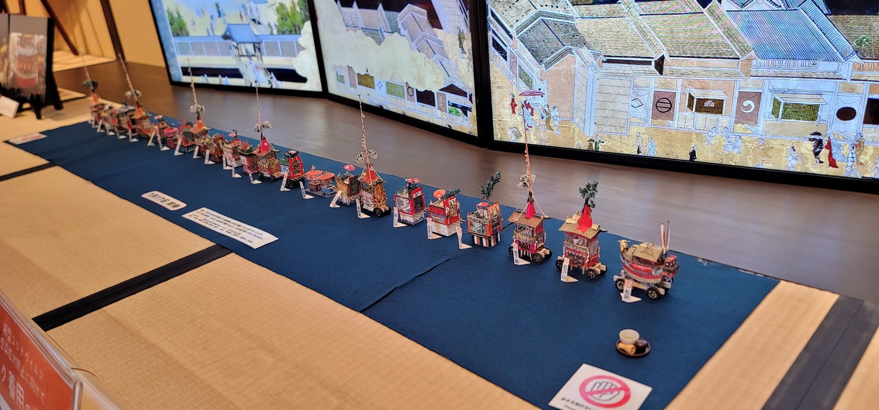 There are seats in front of this display, allowing for leisurely viewing.