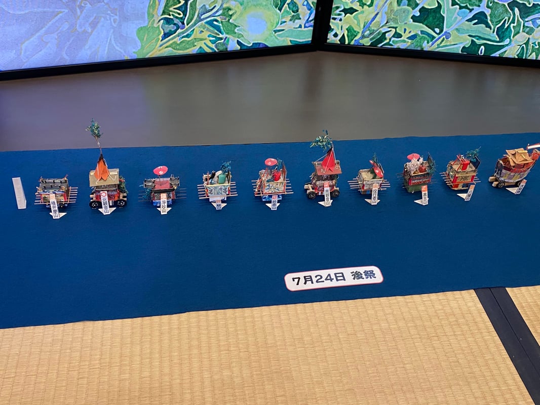 A miniature model of a traditional festival float.